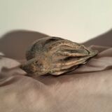 Signed bird sculpture