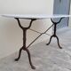 Restaurant bistro table in oval marble and decorated cast iron bases -1m51