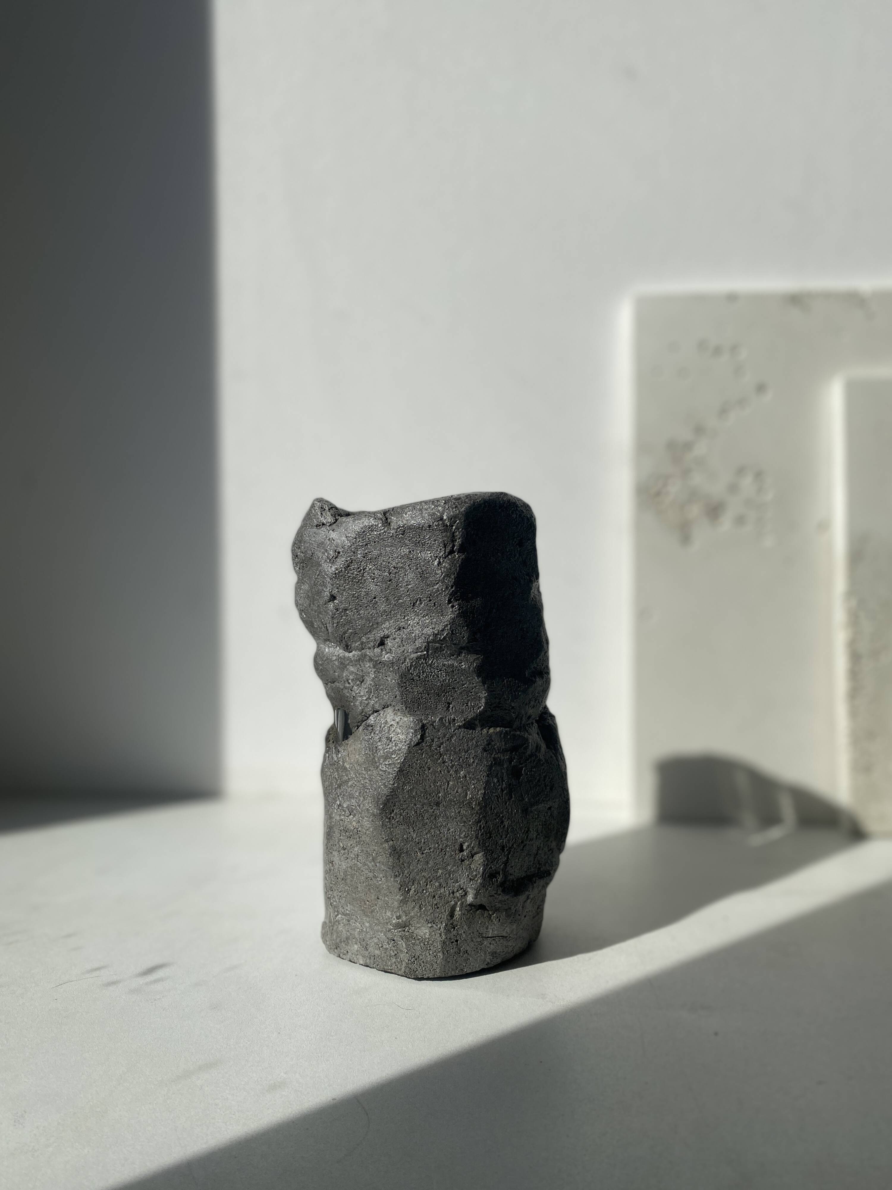 Sculpted concrete vase