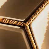 Compartment dish for appetizers, made of porcelain with a wicker support.