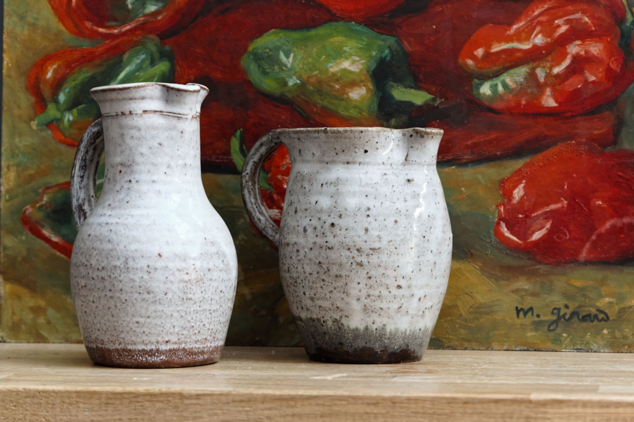 Pair of glazed terracotta pitchers