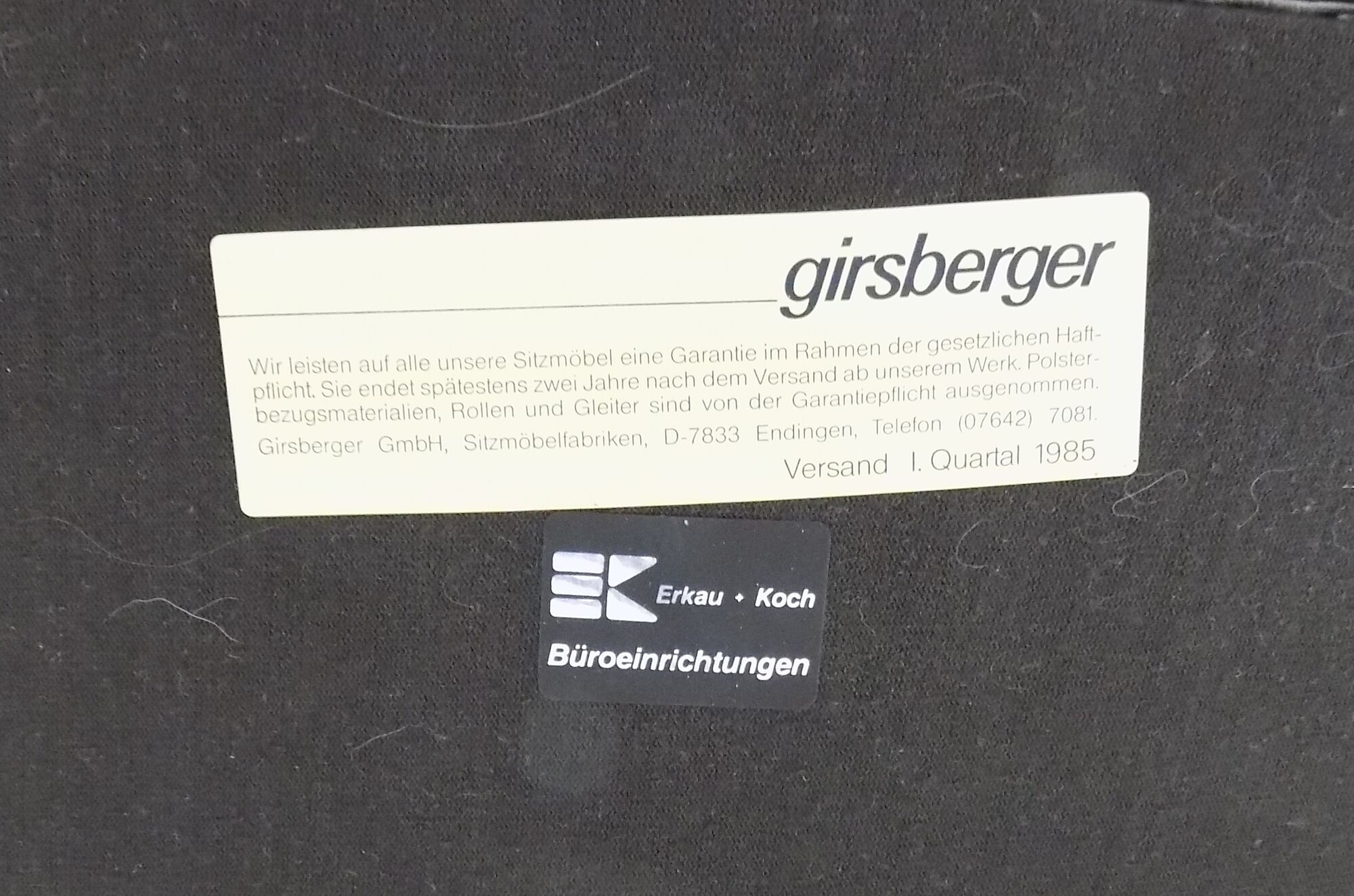 Eurochair set of 2 black leather lounge chairs by Girsberger
