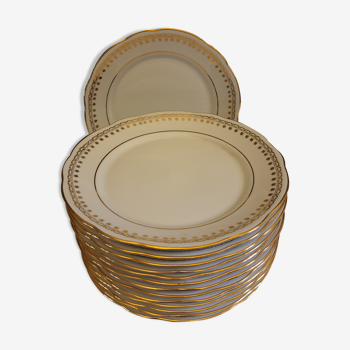 Suite of 14 flat plates golden white porcelain