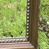 Rustic mirror called brutalist, molded carved natural wood