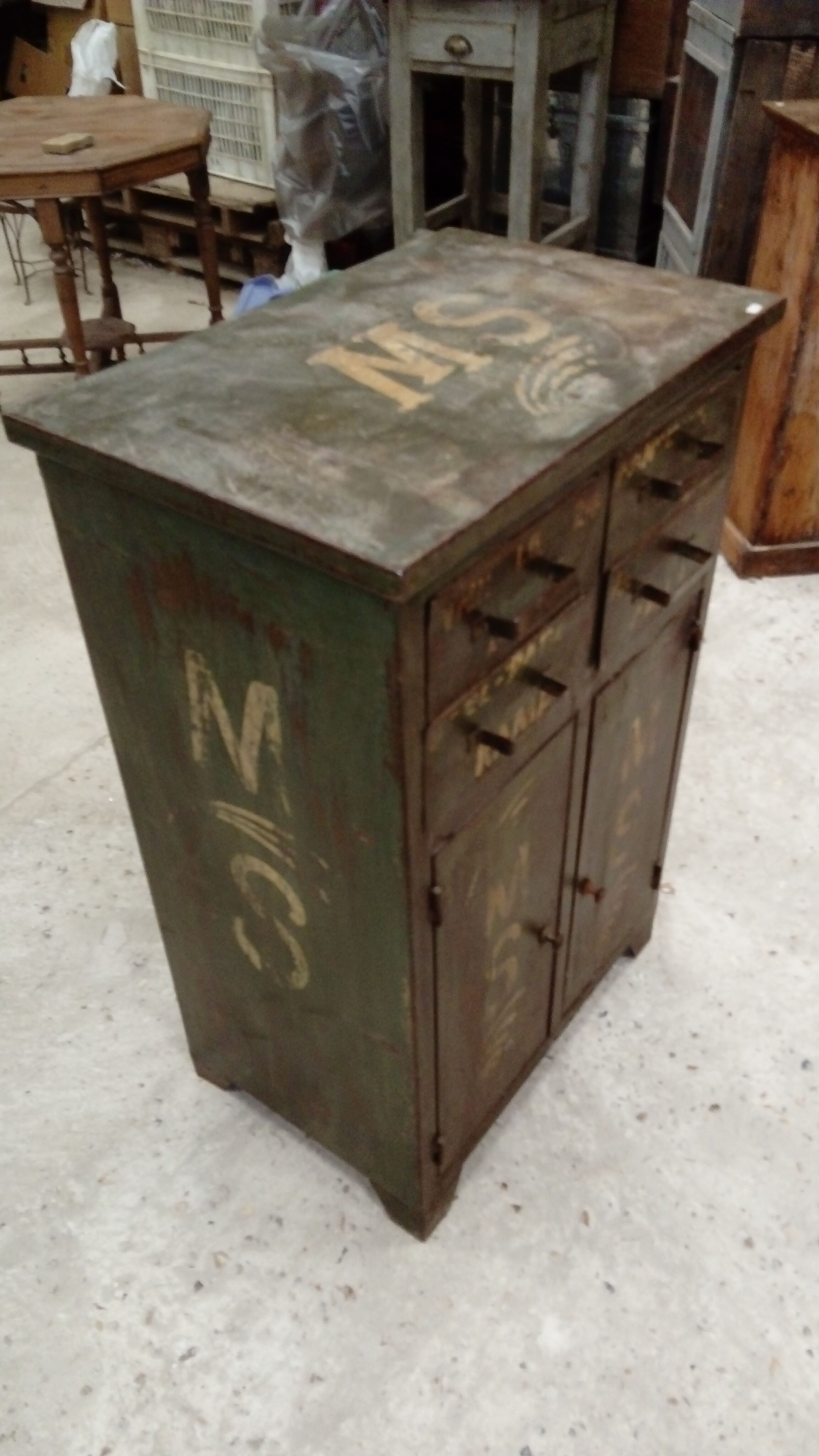 Patinated metal workshop furniture.