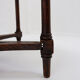 Hexagonal pedestal table or side table with a lattice structure and star pattern.