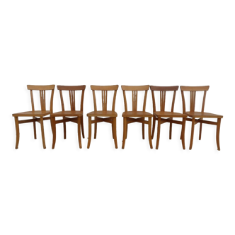 Lot de 6 chaises en bois  de la marque Luterma dans leurs patines