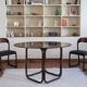 Round dining table in rattan, smoked glass top, 1970s.