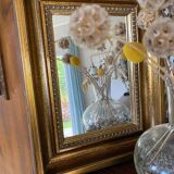 Bronze-colored framed mirror