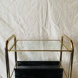 Magazine rack, saddle on vintage wheels