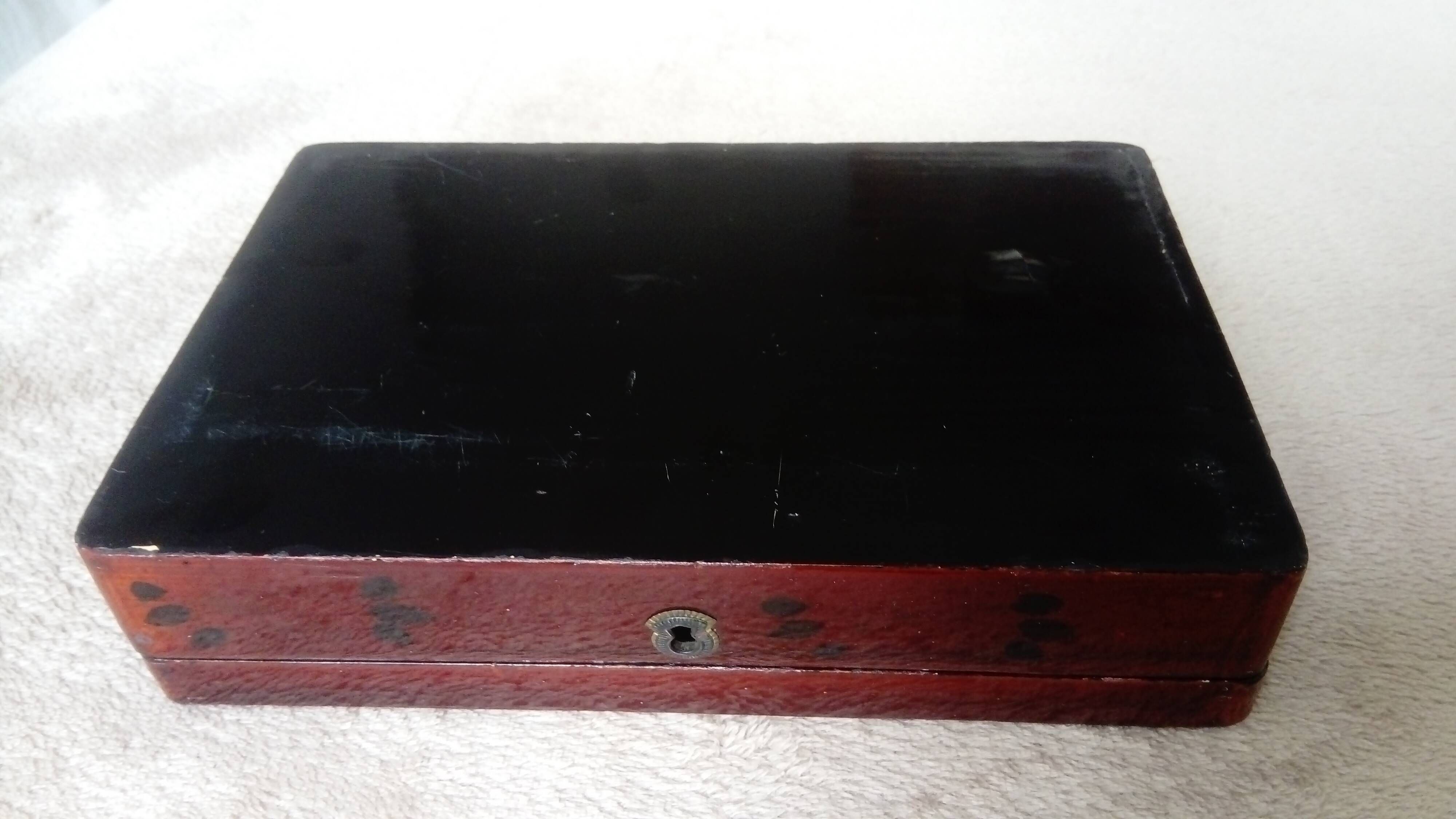 Old lacquered wooden box with china or japan decoration, bird and flower