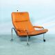 60s cognac leather designer armchair, mid-century modern leather lounge chair.
