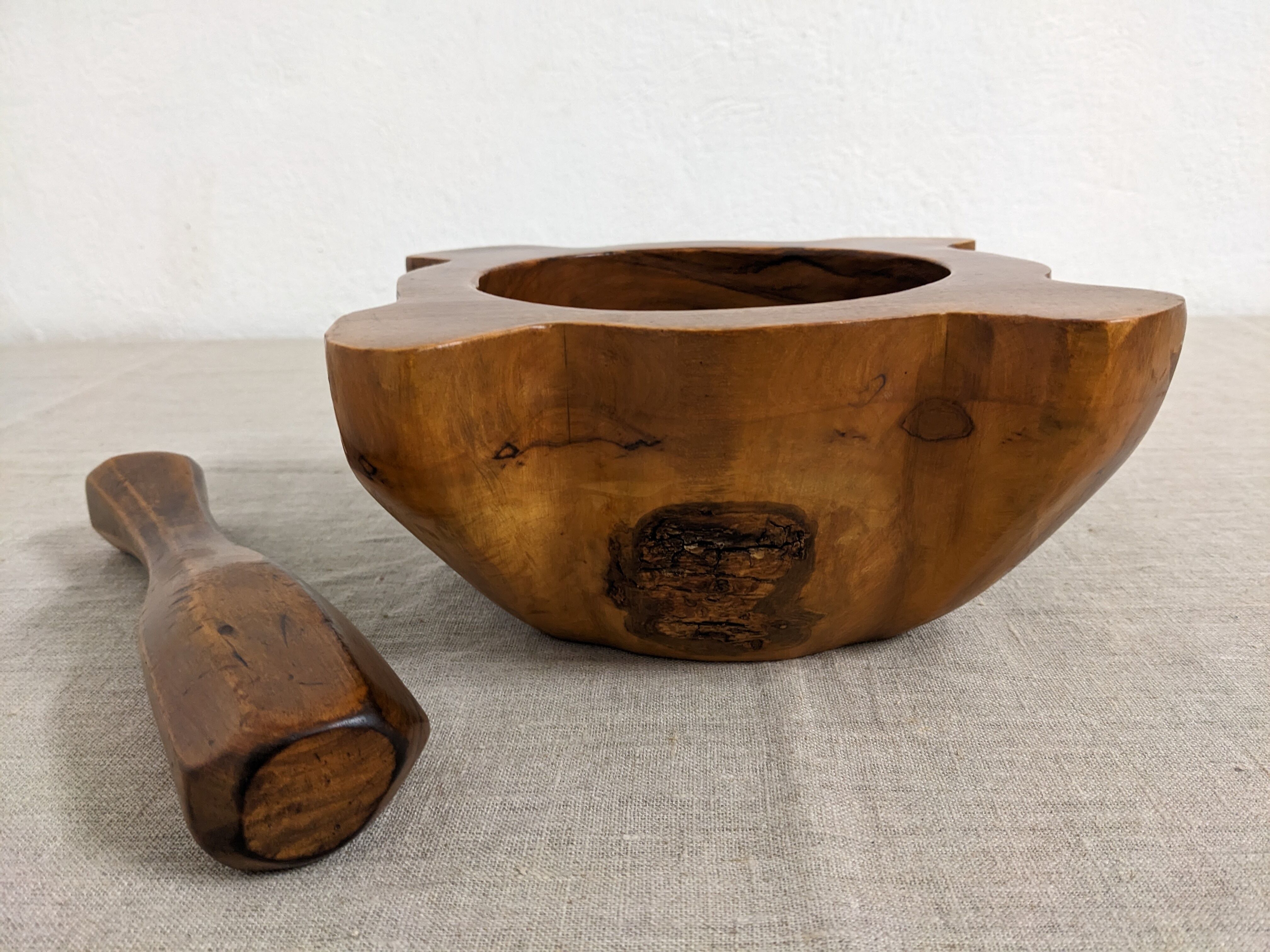 Mortar and its vintage olive wood pestle