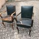 2 Dark green vintage wood and leather armchairs