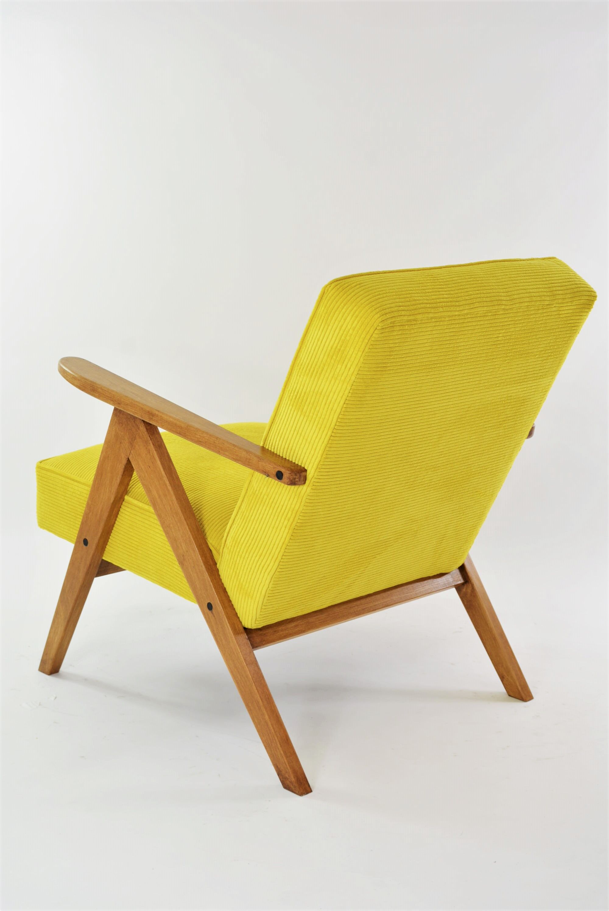 Kompas armchair yellow ribbed velvet