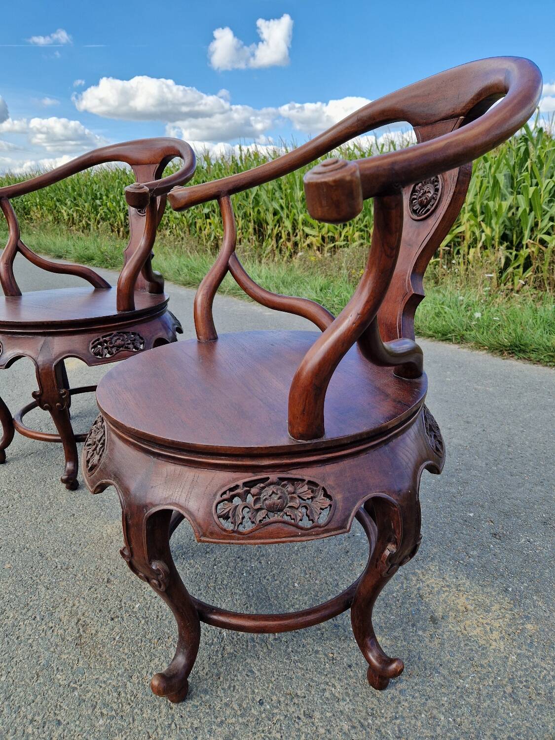 Pair of antique Chinese carved mahogany armchairs, circa 1960s