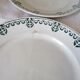 Set of 11 flat earthenware plates