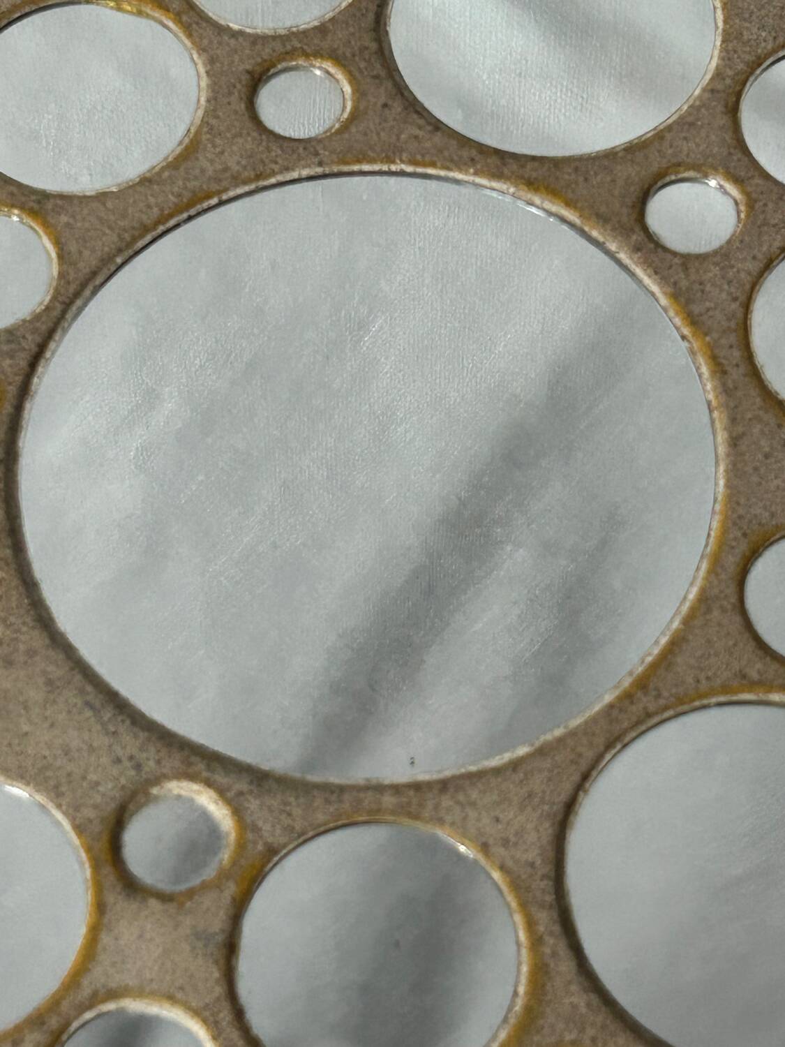 Round ceramic mirror