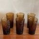 6 orangeade glasses with tree bark