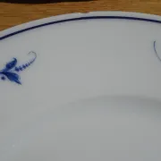 Fine Limoges porcelain dessert service: dish and 12 plates.