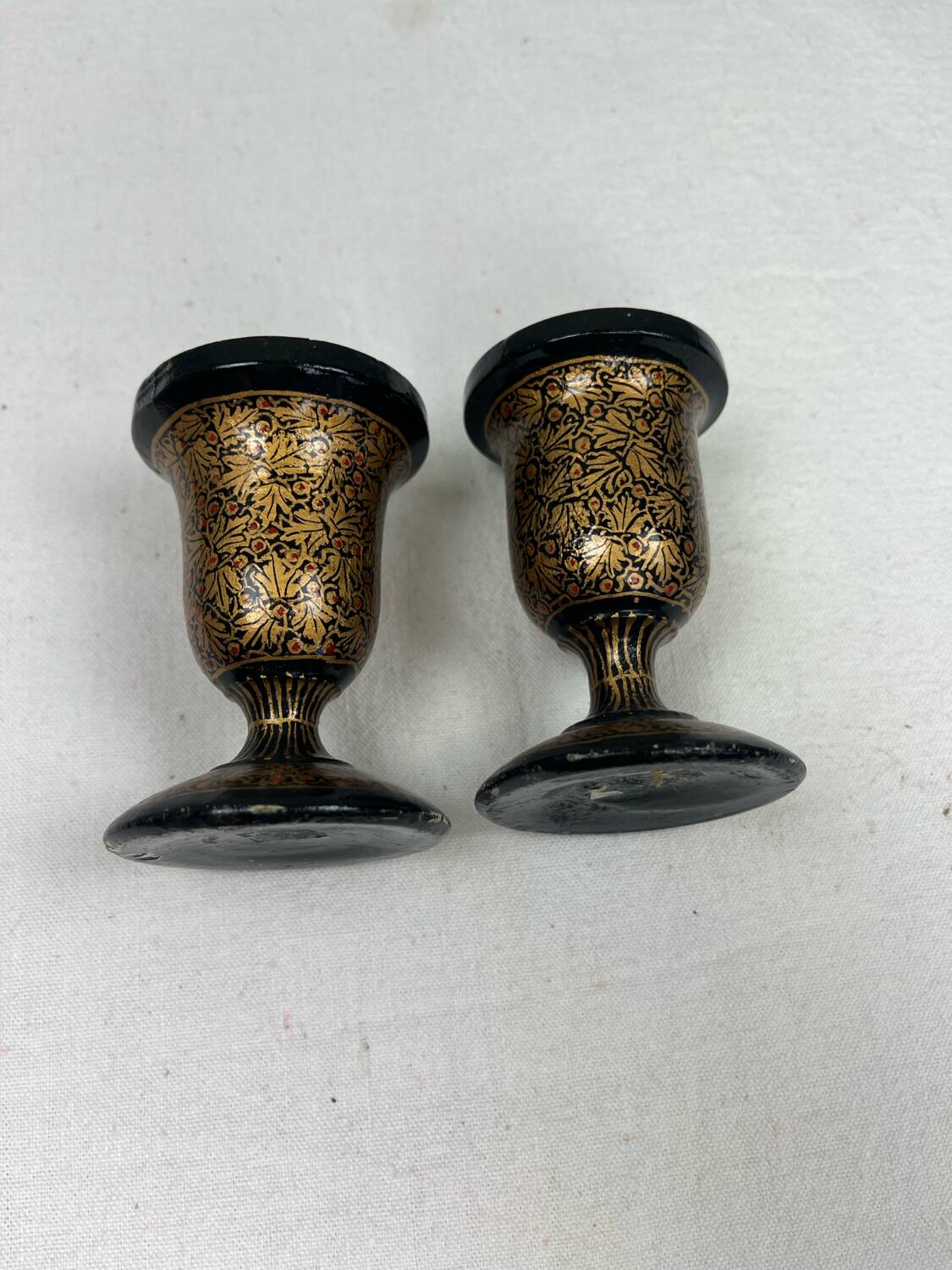 Pair of lacquered wooden candlesticks