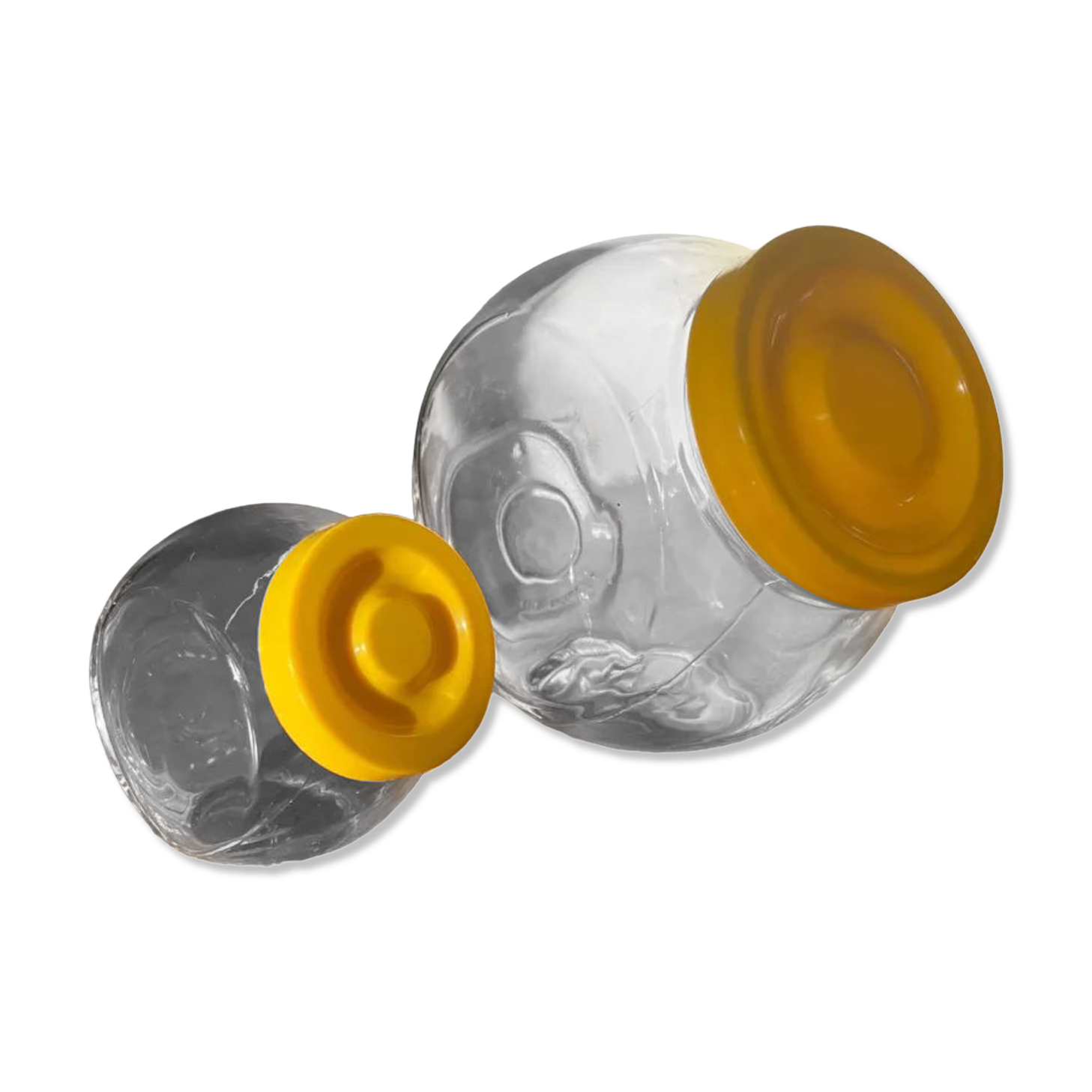 Pair of yellow vintage candy jars