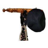 Turned wooden coat rack