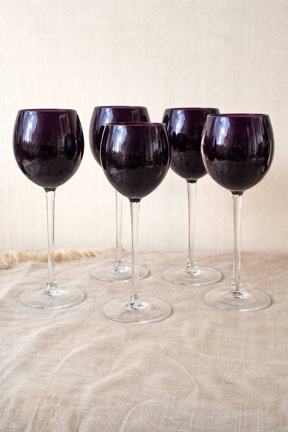 Footed glasses in blown purple bubble glass, Murano style.