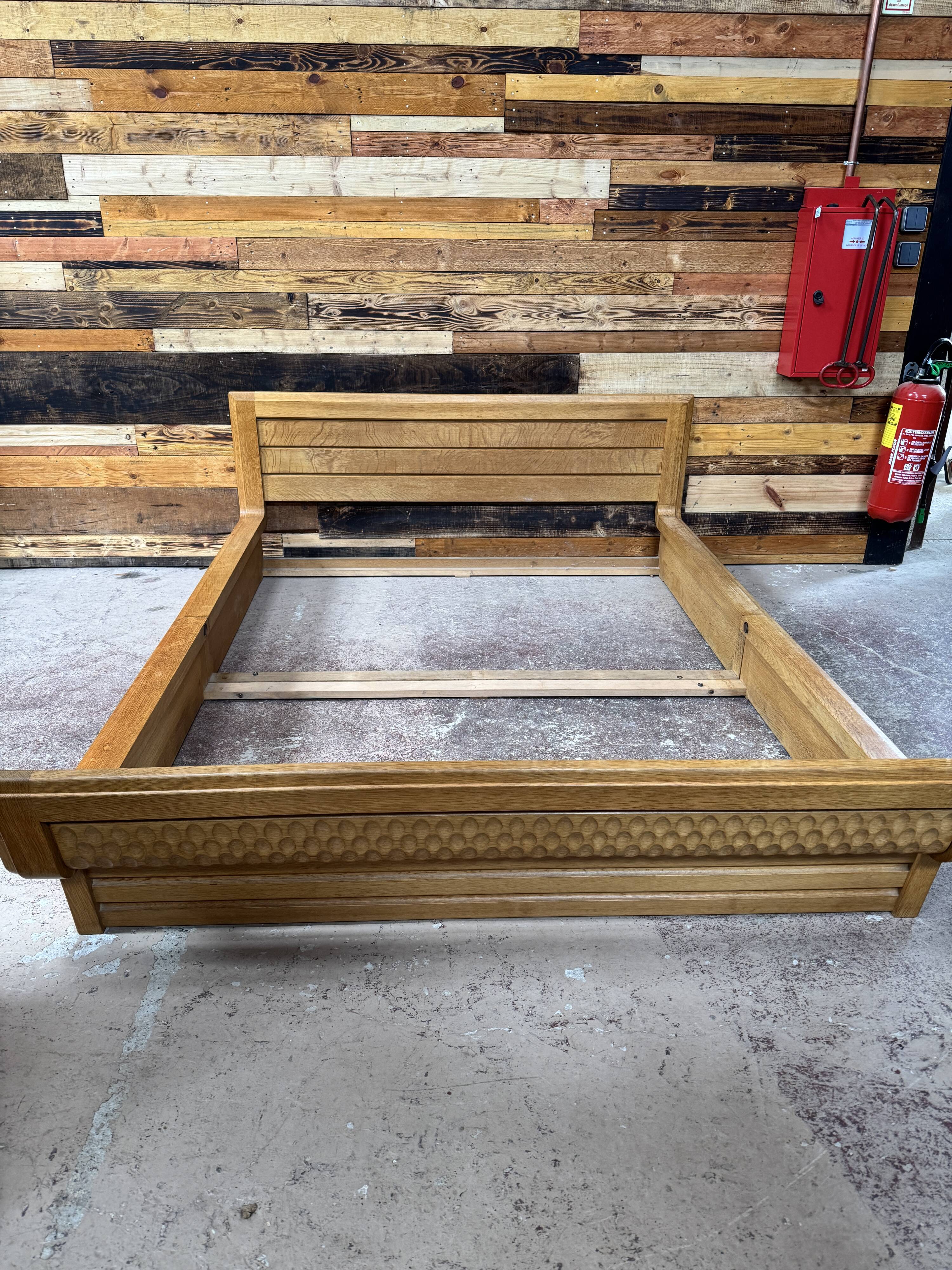 Sculpted oak bed by Guillerme & Chambron