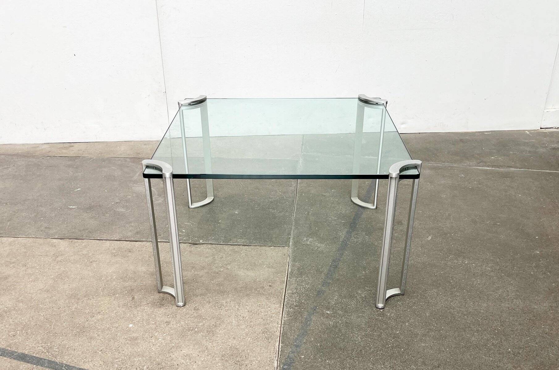 Vintage Space Age coffee table in glass and aluminium attributed to Peter Ghyczy, 1970s.