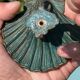 Antique candlestick base – stylised marine fish in patinated bronze