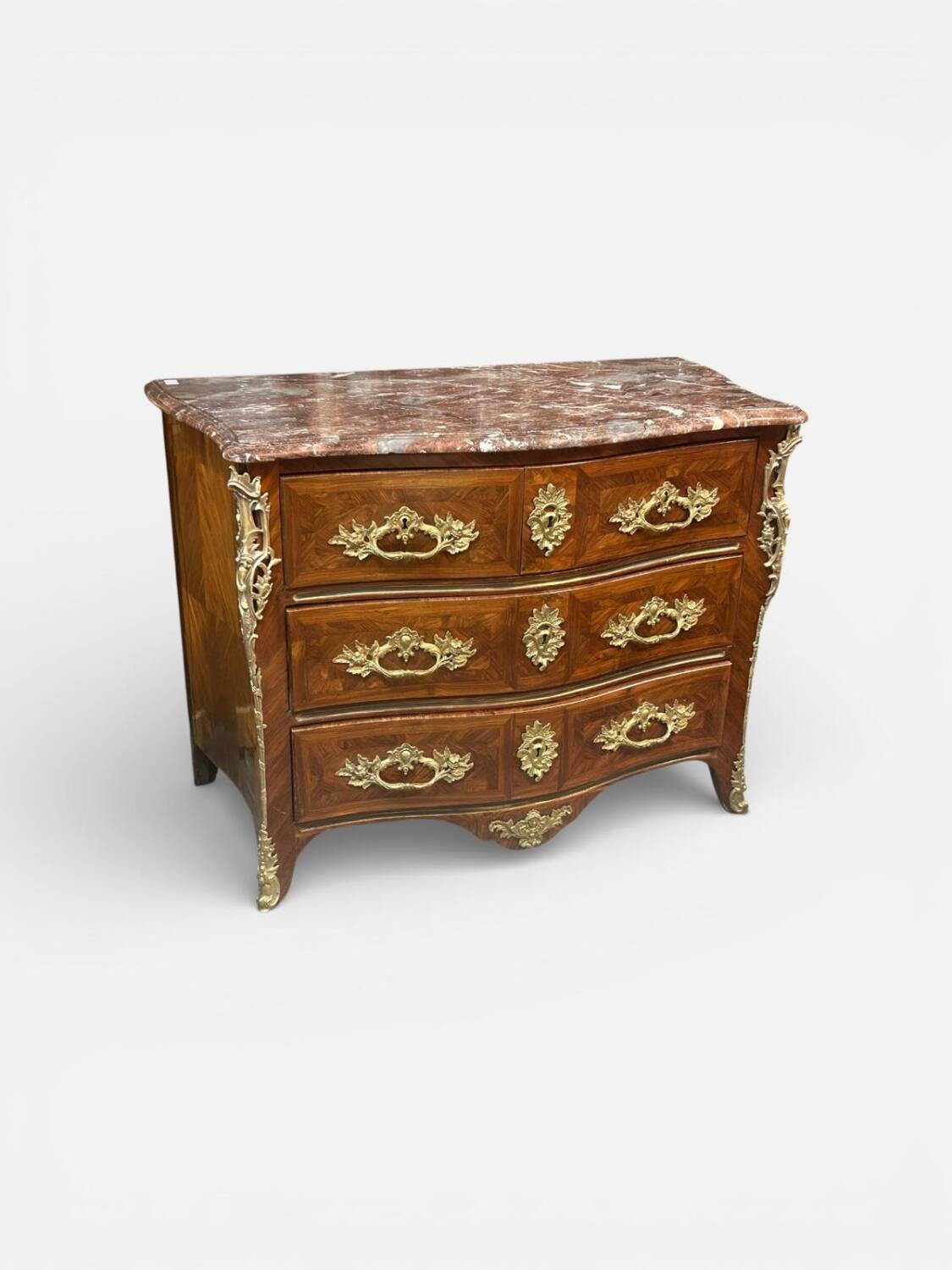 Louis XV period commode with violet wood veneer.