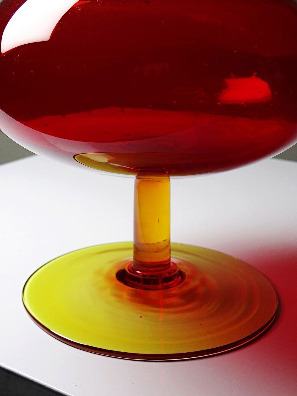 Vintage blown glass vase with "controlled" bubbles in red and yellow, 1960s-1970s.