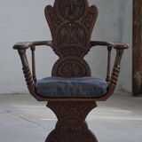 Scandinavian armchair in solid oak with cushion, folk art, early 19th century.
