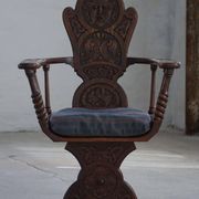 Scandinavian armchair in solid oak with cushion, folk art, early 19th century.