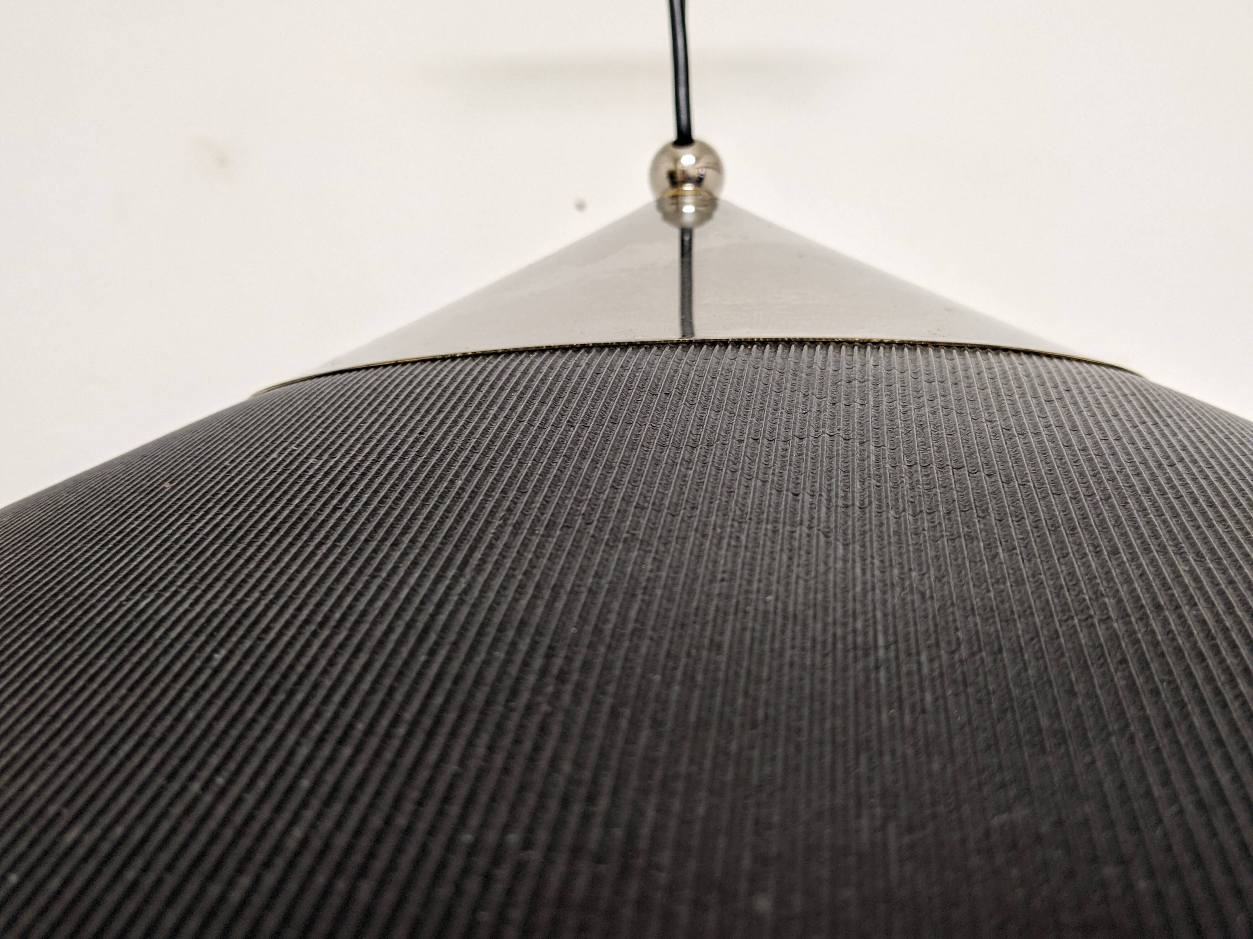 XXL black marmorite saucer suspension, Italy circa 1970.