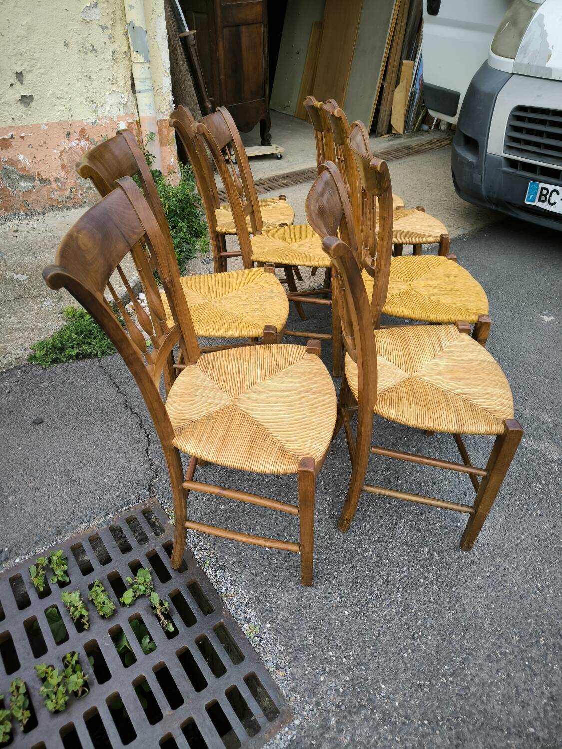 Set of 8 solid cherrywood chairs with straw seats, Directoire period