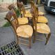 Set of 8 solid cherrywood chairs with straw seats, Directoire period