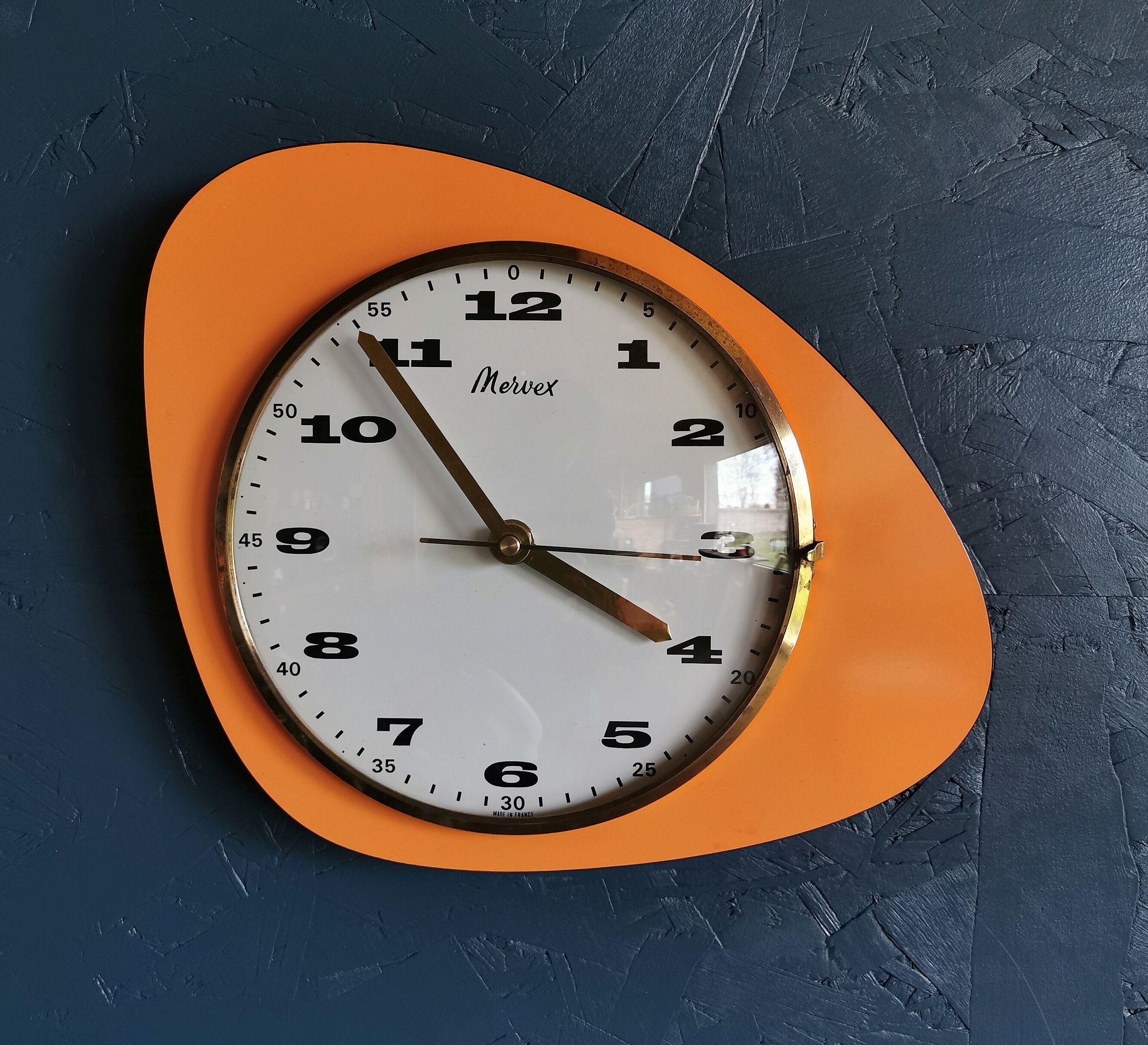 Vintage formica clock asymmetrical silent wall clock "Mervex orange"