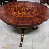 Charles X period gueridon in marquetry.