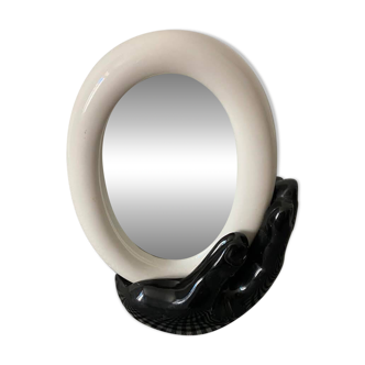 Main miroir