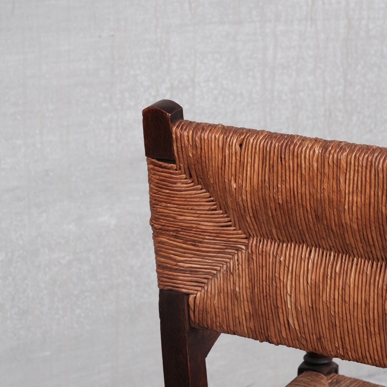 Pair of mid-century oak and rush french armchairs