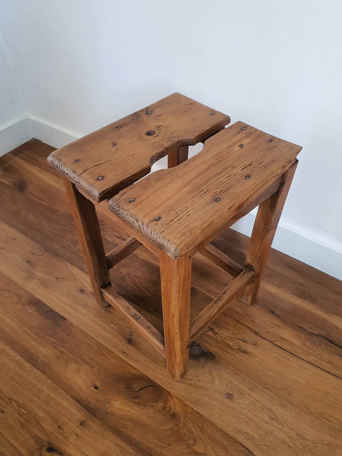 Antique wooden farm stool