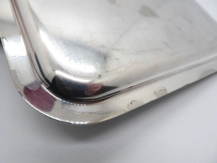 Small silver metal top
