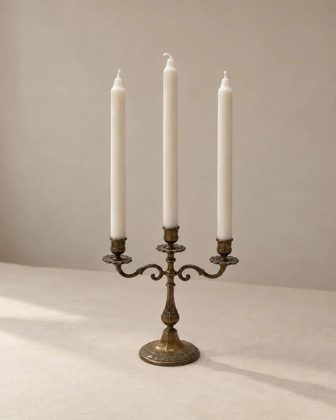 Three-light candelabrum in brass — France, 20th century