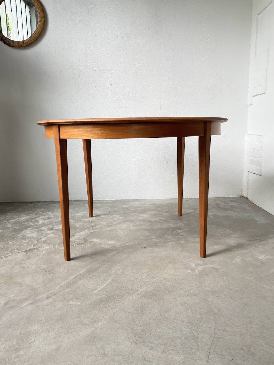 Scandinavian round teak table with extension