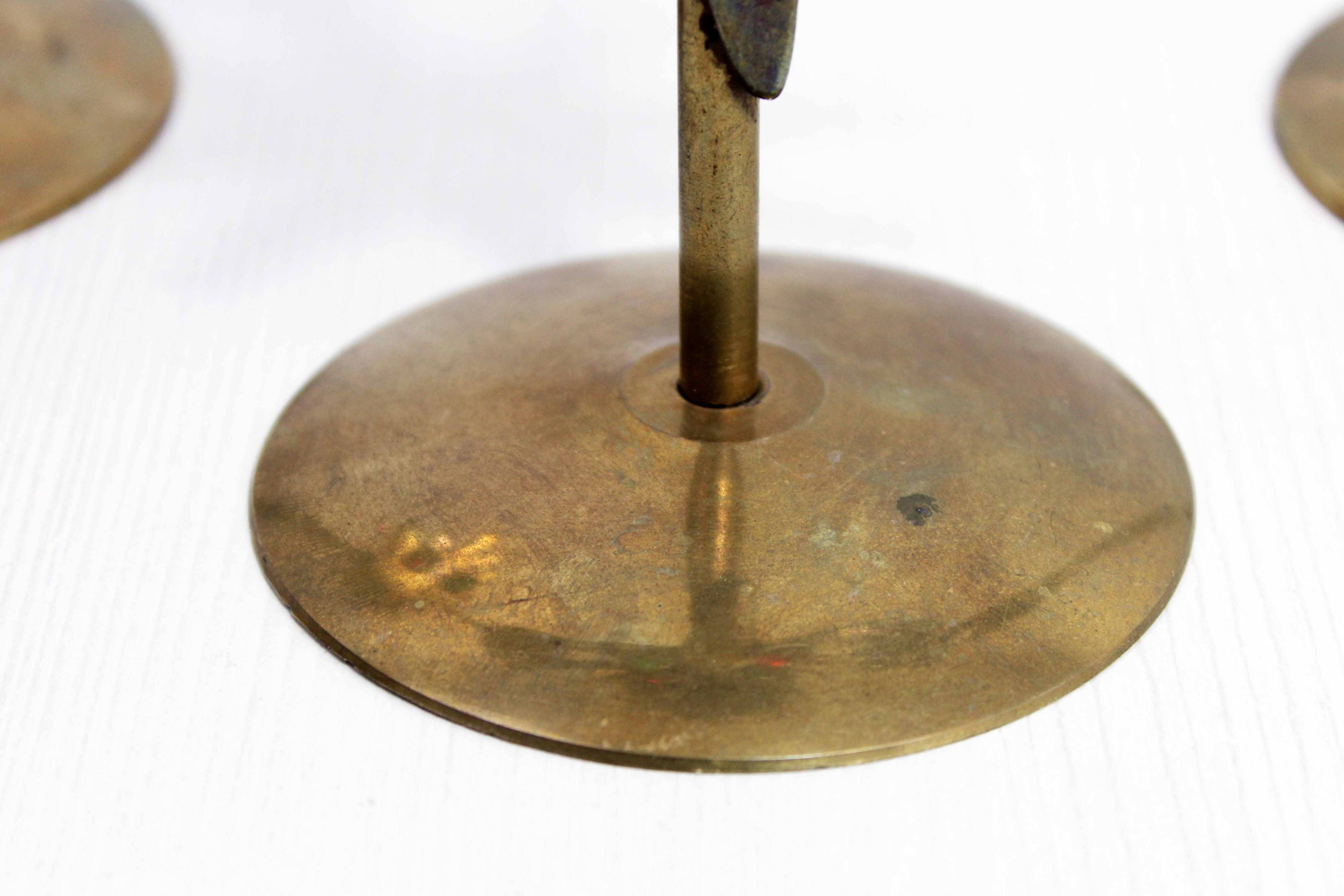 Set of 3 brass sun candle holders