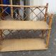 Colonial style rattan wall shelf