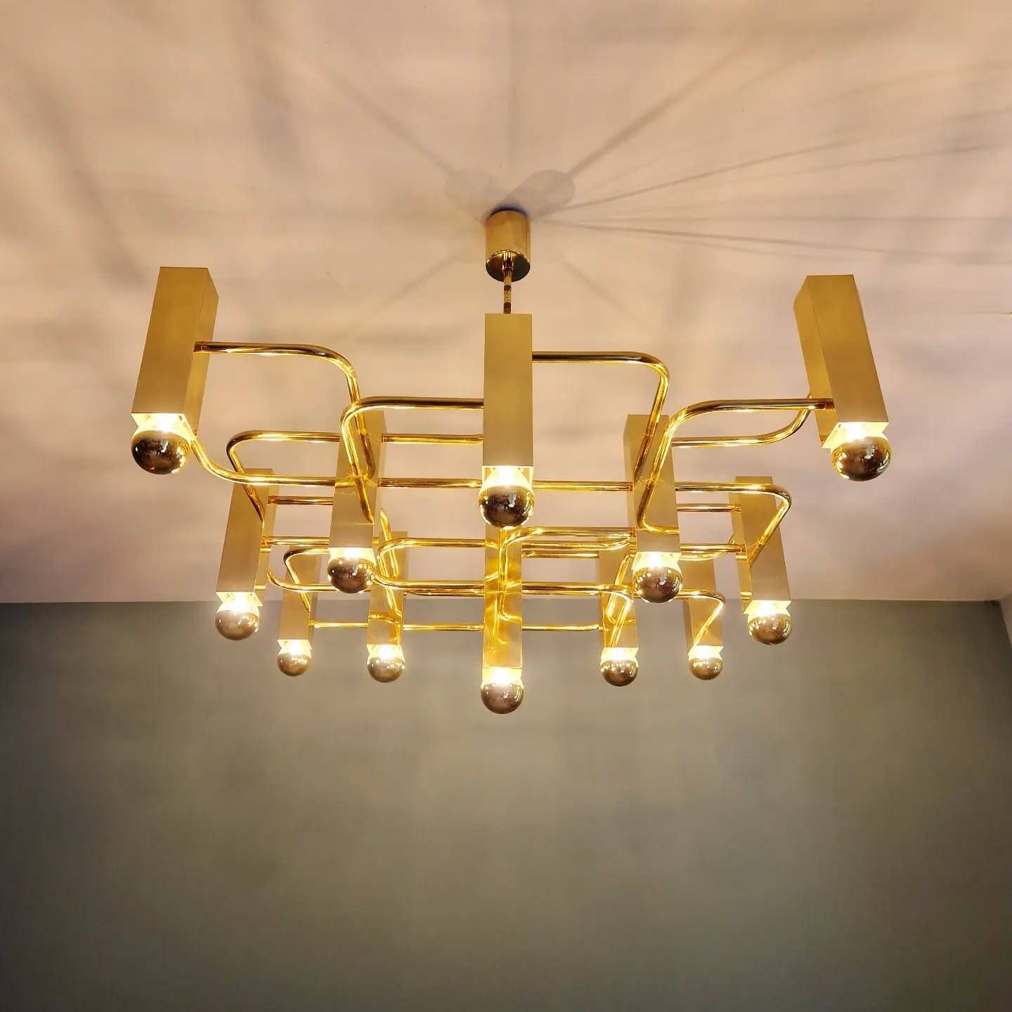 Geometric brass chandelier, design by Gaetano Sciolari, Boulanger, 1970.