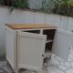 Vintage beige sideboard with oak top.